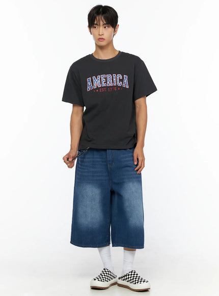 Men's Keyring Detail Jorts IL515 blue full-body front shot on male model styled with charcoal America EST.1776 graphic tee and checkerboard slip-on sneakers