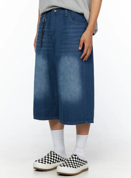 Men's Keyring Detail Jorts IL515 blue front three-quarter close-up on model highlighting wide-leg washed denim cut rope keyring and back pocket stitching detail