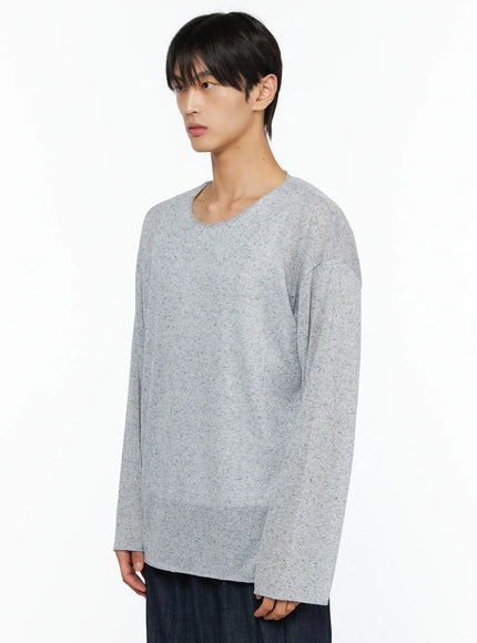 Men's Knit Long Sleeve T-Shirt IL528 Gray side shot on male model looking forward relaxed fit speckled melange knit long sleeves styled with wide-leg dark trousers