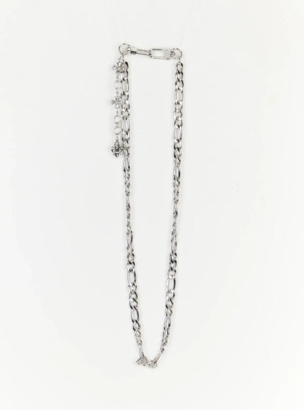Men's Layered Cross Chain IL509 Silver flat-lay full length view showing complete double-strand figaro chain with carabiner clip cross charm and fleur-de-lis charm on white background