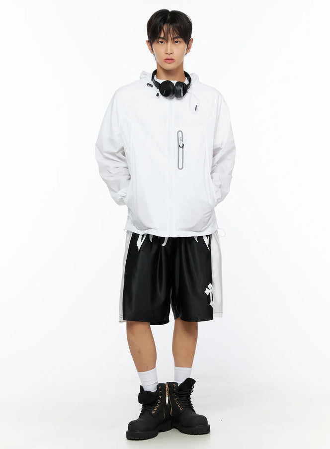 LEWKIN Men's Lightweight Windbreaker Jacket IL515 White front shot on male model standing upright styled with black shorts and boots with headphones