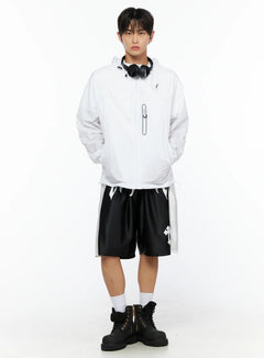 LEWKIN Men's Lightweight Windbreaker Jacket IL515 White front shot on male model standing upright styled with black shorts and boots with headphones