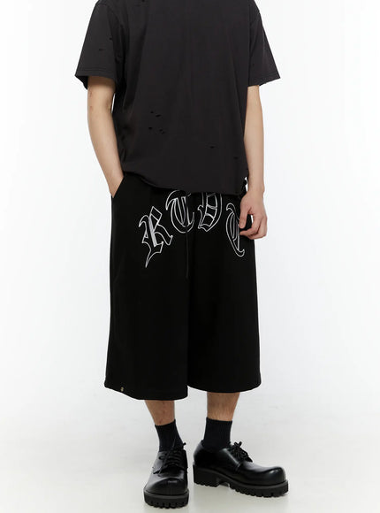 Men's Logo Embroidered Snap Hem Bermuda Sweat Shorts (Black) IL507 in Black, size M/L