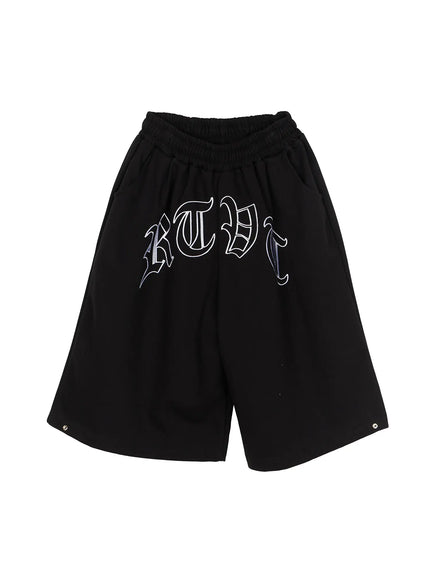 Men's Logo Embroidered Snap Hem Bermuda Sweat Shorts (Black) IL507 flat-lay front showing elastic waist gothic arc logo embroidery wide leg and metal snap hem