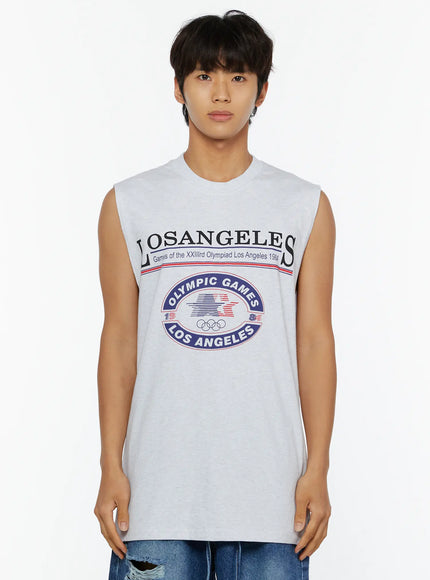 Men's Los Angeles Print Tank IL509 Light gray close-up front shot on male model showing LOSANGELES Olympic Games 1984 graphic print and crew neckline detail