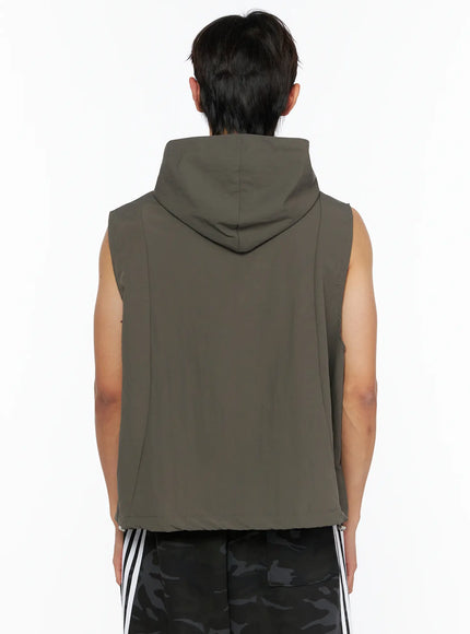 Men's Nylon Hooded Vest IL520 Dark green back shot on male model showing clean seam lines, hood drape, and relaxed boxy silhouette