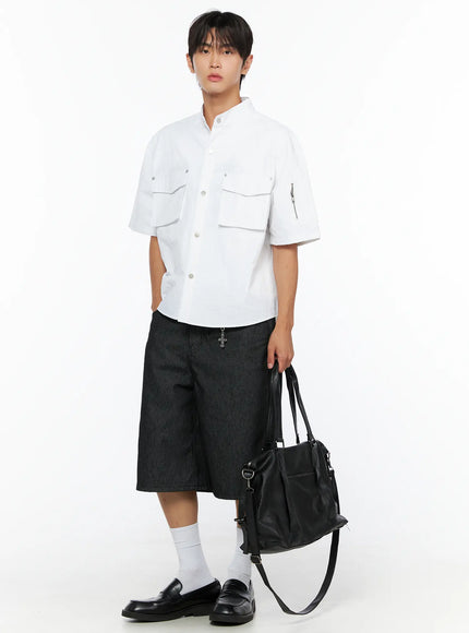 LEWKIN Men's Nylon Utility Shirt IL515 White full-body front shot on model styled with dark striped shorts, white socks, black loafers, and black leather bag