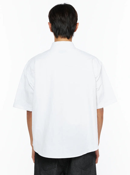 Men's Nylon Utility Shirt IL515 White back shot on model showing clean boxy silhouette, band collar, and short sleeve cut in lightweight nylon fabric