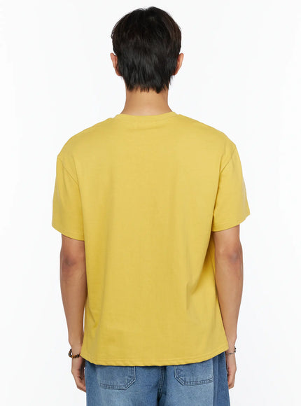 Men's Osaka Graphic T-Shirt IL520 Yellow back shot on model showing clean plain back, relaxed boxy cotton silhouette, crew neck construction