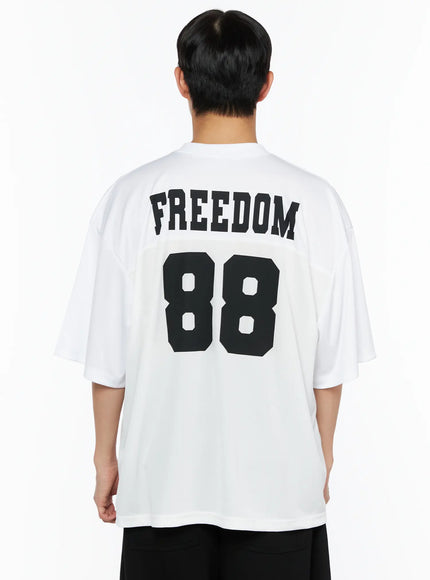 Men's Oversized Mesh Rugby Tee IL514 White back shot on male model, large black FREEDOM 88 varsity print, mesh panel detail at upper back, oversized drop-shoulder cut