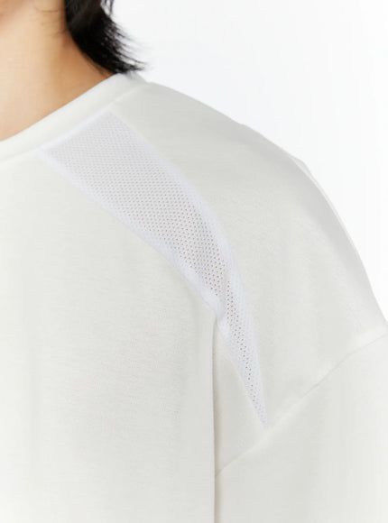 Men's Oversized Mesh Tee (White) IL509 white close-up detail of shoulder area showing diagonal perforated mesh panel stitching