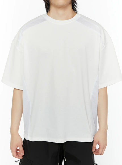 Men's Oversized Mesh Tee (White) IL509 white front shot on male model standing relaxed showing mesh side panel texture