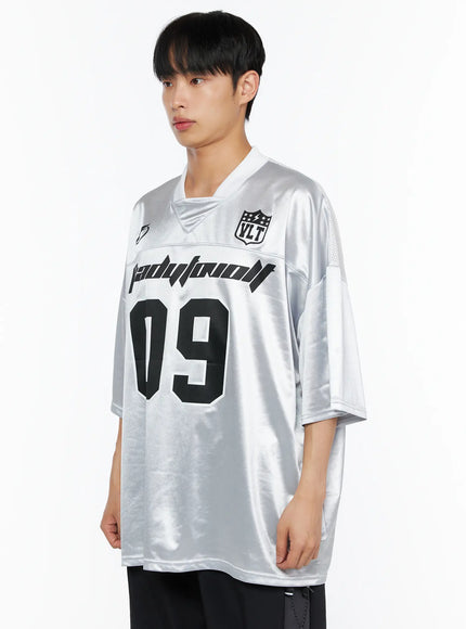 Men's Oversized Sports Jersey Tee IL514 Silver side shot on male model highlighting glossy satin fabric Readytoovolt 09 front print and VLT badge