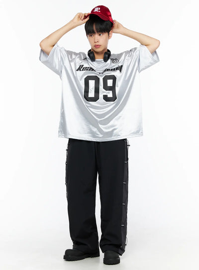 LEWKIN Men's Oversized Sports Jersey Tee IL514 Silver front shot on male model wearing red cap and headphones styled with black cargo pants