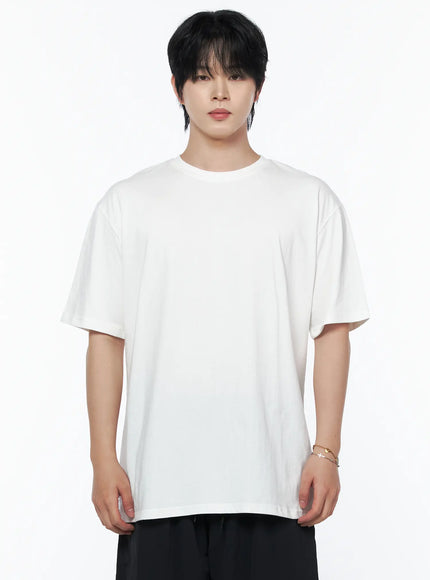 Men's Oversized Studded Tee IL502 White front crop shot on male model upper-body close-up showing round neckline and relaxed boxy cotton fabric texture