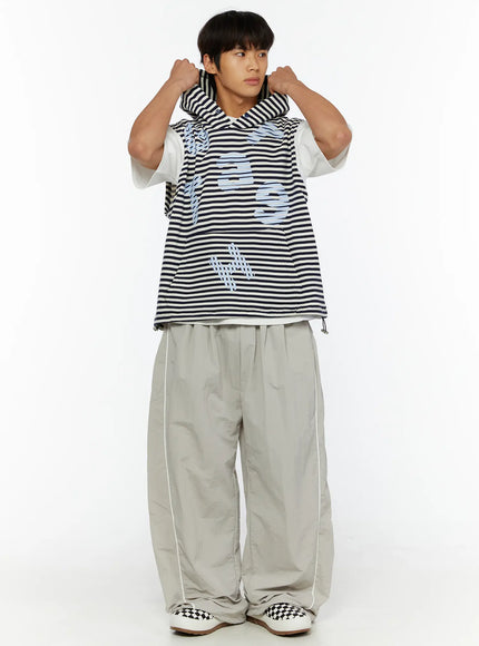 Men's Oversized Sweatpants IL510 Light gray full-body front view on male model styled with striped hooded vest and white tee, oversized wide-leg silhouette