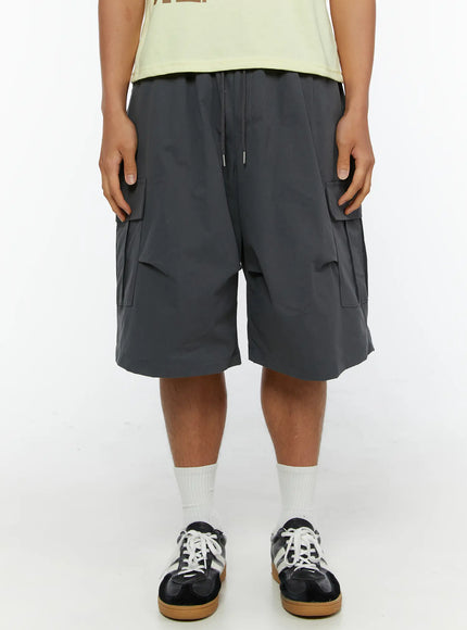 LEWKIN Men's Parachute Cargo Shorts IL515 Dark gray front shot on male model wearing light yellow tee and sneakers, elastic drawstring waist, cargo pockets