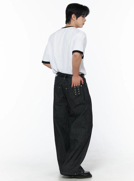 Men's Patch Detail Short Sleeve Tee IU523 White back three-quarter view on male model, oversized short sleeve silhouette, black ringer trim at collar and cuffs, styled with black pinstripe wide-leg pants
