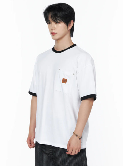 Men's Patch Detail Short Sleeve Tee IU523 White side view on male model, oversized cotton silhouette, chest pocket with leather patch and metal pin detail, black contrast ringer trim