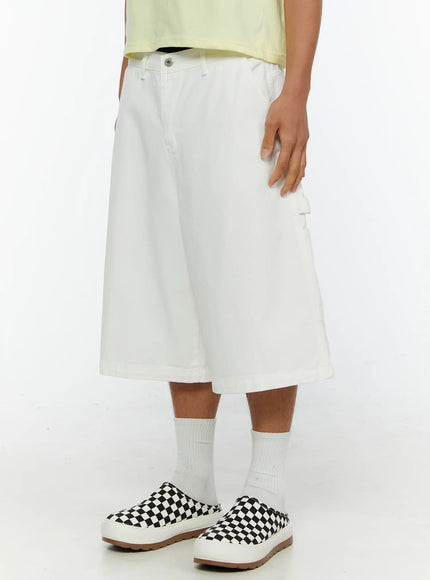 Men's Patch Pocket Jorts IL515 White side close-up on model revealing cargo patch pocket detail and relaxed wide-leg cut
