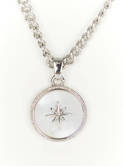 Men's Pendant Necklace IL510 Silver close-up detail of round mother-of-pearl coin pendant with eight-point north star engraving and milgrain bezel edge on curb chain