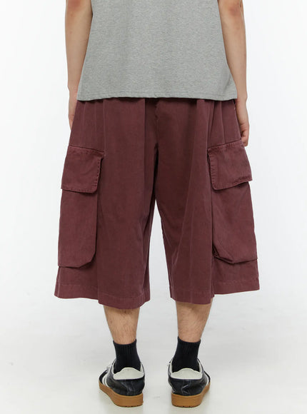 Men's Pigment Bermuda Cargo Shorts (Dark Pink) IL507 Dark Pink back view on model showing rear cargo pockets, wide boxy cut, and elastic waistband