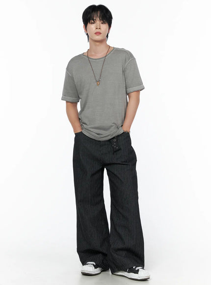 Men's Pigment Washed T-Shirt IU523 Gray full-body front shot on male model hands in pockets styled with black pinstripe wide-leg trousers and necklace
