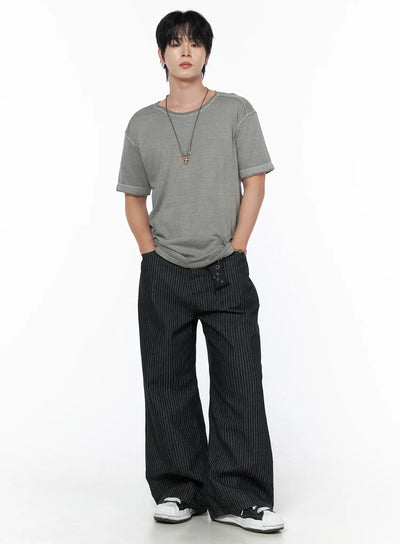 Men's Pigment Washed T-Shirt IU523 Gray full-body front shot on male model hands in pockets styled with black pinstripe wide-leg trousers and necklace
