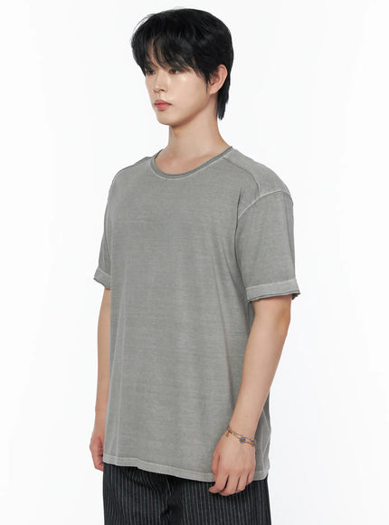 Men's Pigment Washed T-Shirt IU523 Gray side shot on male model upper body showcasing raglan shoulder seam rolled cuff hem and pigment dye gradient texture