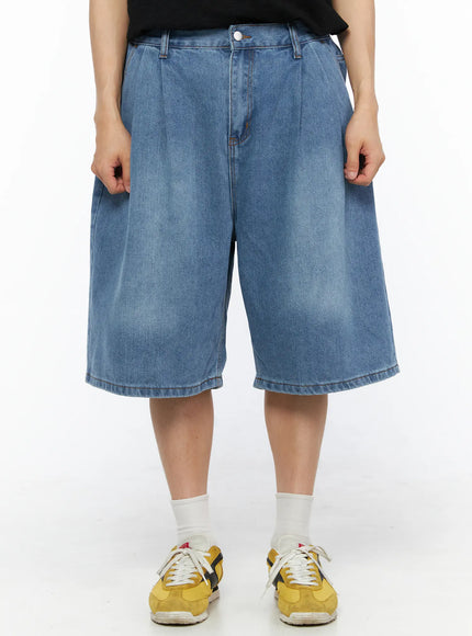 LEWKIN Men's Pintuck Jorts IL510 Blue front view on model wearing black tee and yellow sneakers, wide-leg washed denim shorts