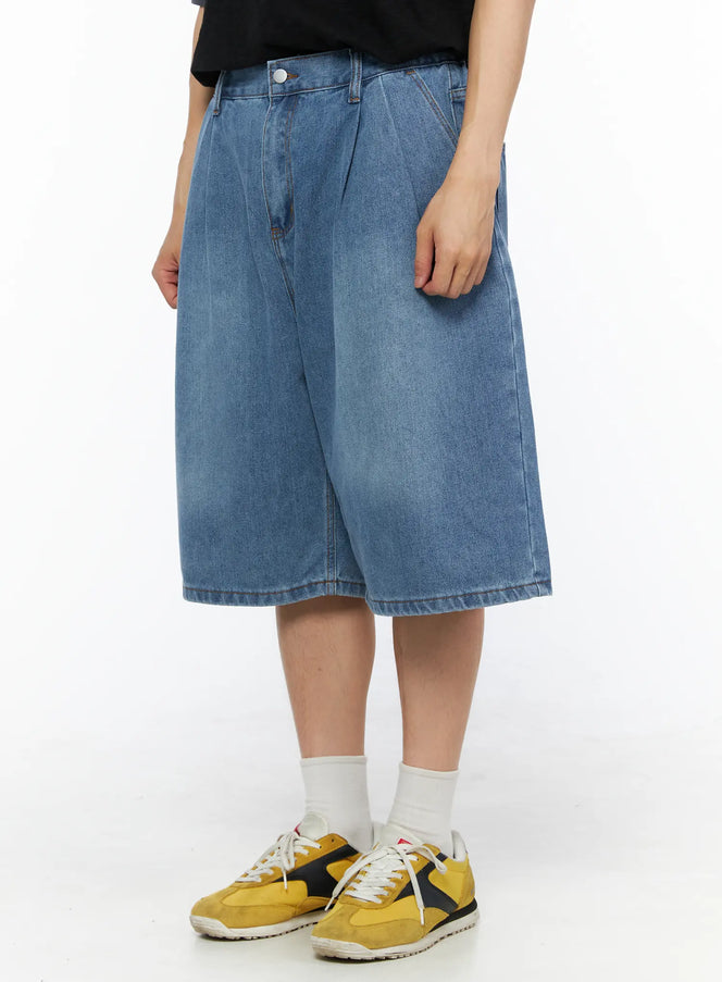 Men's Pintuck Jorts IL510 Blue close-up side-angled front view on model showing pintuck detail, elastic waistband, and faded denim texture