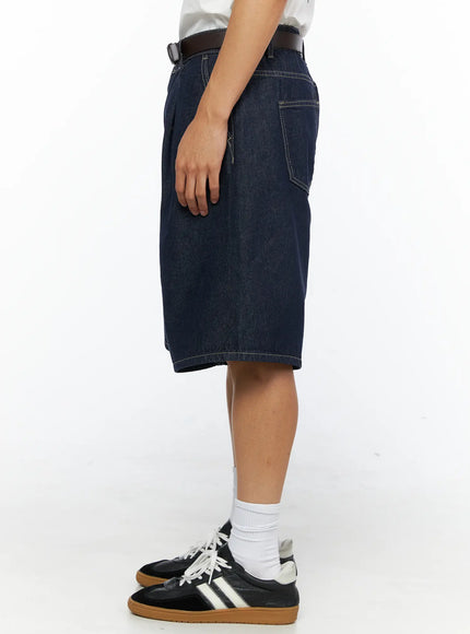 Men's Pintuck Wide Bermuda Shorts IL528 Dark blue side view on model showing back pocket and contrast topstitching with brown belt