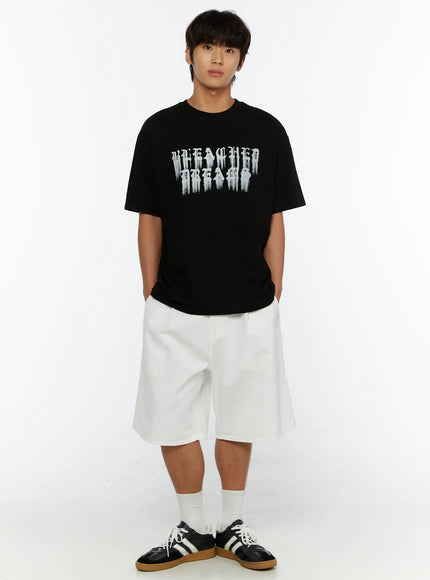Men's Pintuck Wide-Fit Shorts IL515 White full-body front view on male model styled with black graphic tee and black sneakers, standing pose