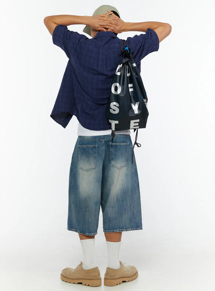 Men's Plaid Button-Up Shirt IL513 Dark blue back shot on model with hands behind head, showing full back panel, short sleeves, and styling with denim shorts