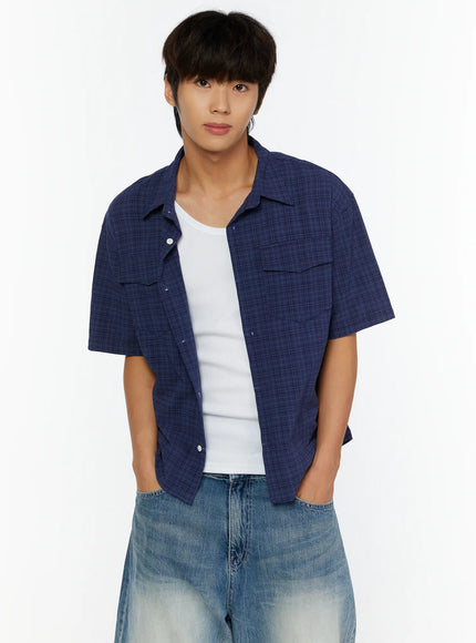 Men's Plaid Button-Up Shirt IL513 Dark blue close-up front shot on model showing open collar, dual chest pockets, and plaid texture