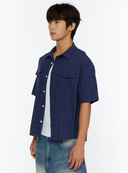 Men's Plaid Button-Up Shirt IL513 Dark blue side shot on model showing collar, chest pocket flap, button placket, and cropped boxy silhouette
