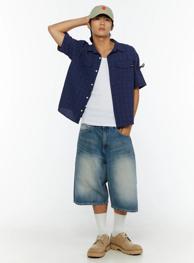LEWKIN Men's Plaid Button-Up Shirt IL513 Dark blue full-body front shot on model styled with cap, denim shorts, and beige shoes