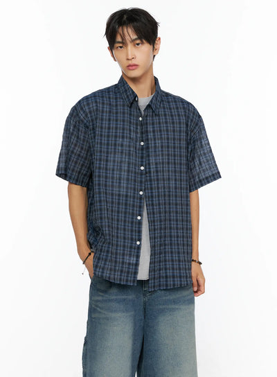 LEWKIN Men's Plaid Button-Up Shirt IL520 Dark blue front shot on male model wearing jeans, oversized short-sleeve plaid shirt with white buttons