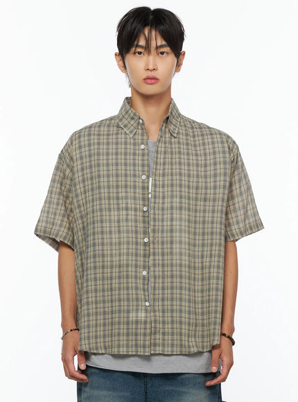 Men's Plaid Button-Up Shirt IL520 khaki green front close-up crop shot on male model, button placket and collar detail, layered over gray tee