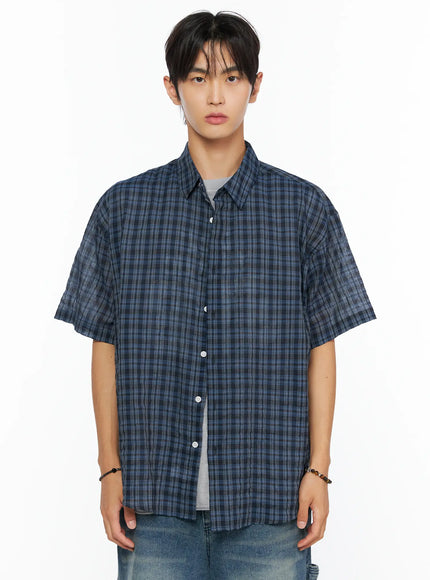 Men's Plaid Button-Up Shirt IL520 Dark blue front close-up crop shot on male model, dark blue plaid pattern with white buttons and point collar, layered over gray tee