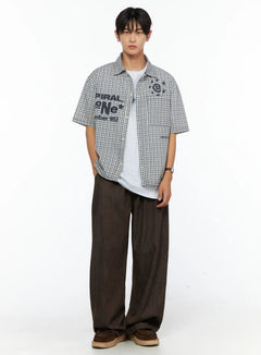 LEWKIN Men's Plaid Graphic Button-Up Shirt IL528 Light beige front full-body shot on male model layered over white tee with wide-leg brown trousers