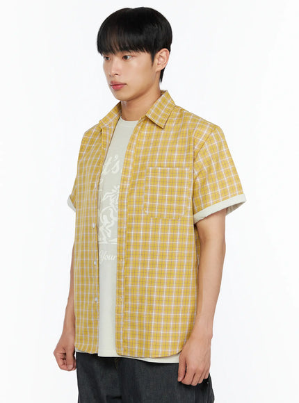 Men's Plaid Short Sleeve Shirt IL510 Yellow side shot on model angled left showing chest pocket rolled cuff hem detail and layered tee underneath