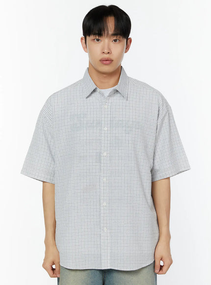 Men's Plaid Short Sleeve Shirt IU529 Grey front shot on male model standing straight showing boxy oversized silhouette fine micro-check pattern and white button placket
