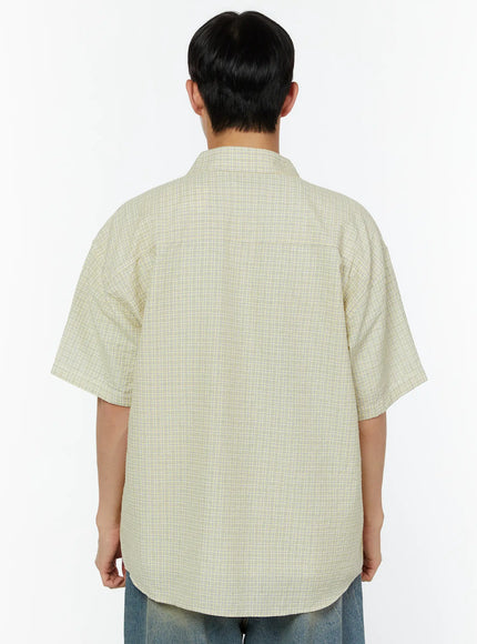 Men's Plaid Short Sleeve Shirt IU529 Light yellow back shot on male model showing yoke seam boxy silhouette and fine micro-check woven fabric