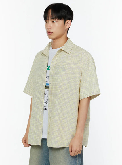 Men's Plaid Short Sleeve Shirt IU529 Light yellow side shot on male model upper-body close-up showing fine check texture open placket and point collar