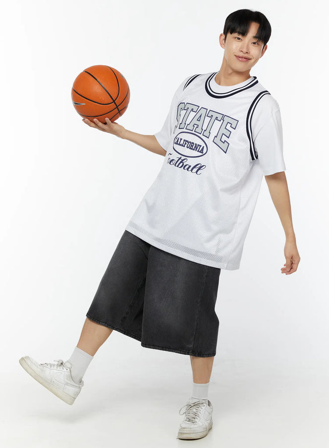 LEWKIN Men's Print Basketball Vest IU529 White front shot on model holding basketball dynamic pose layered over white tee with dark denim shorts mesh fabric