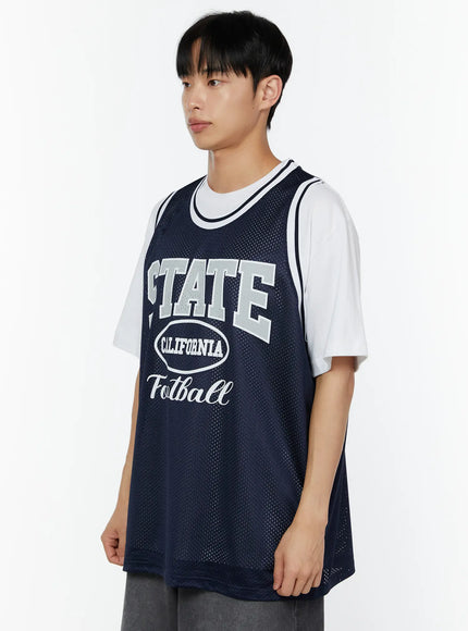 Men's Print Basketball Vest IU529 Navy side shot on model looking away showing STATE California Football graphic on perforated mesh vest over white oversized tee