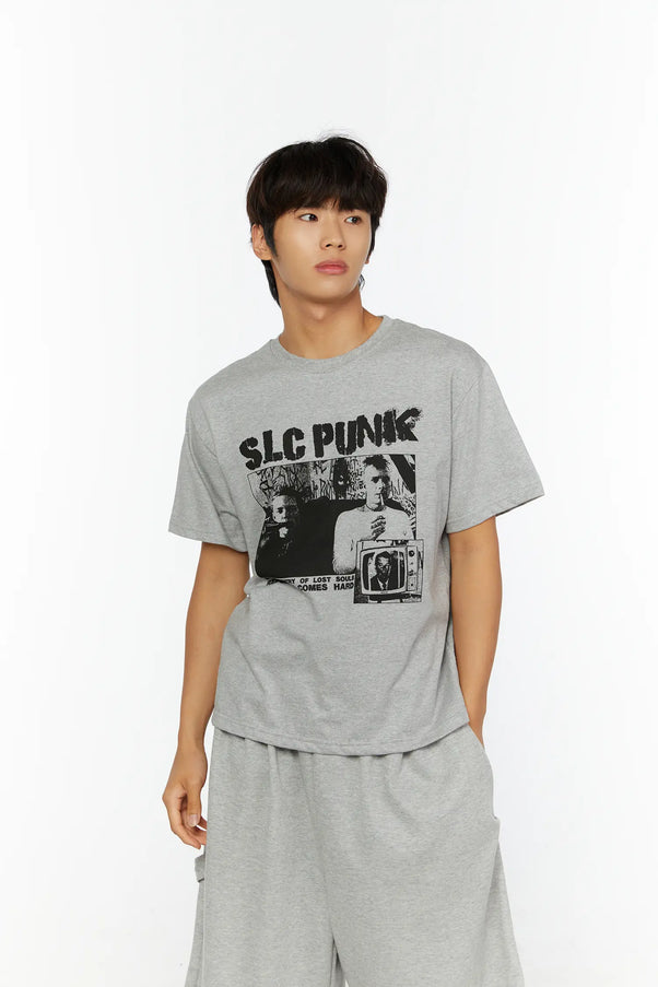 Men's Punk Graphic T-Shirt IL513 Gray front close-up shot on male model looking away showing SLC PUNK black graphic print on cotton tee
