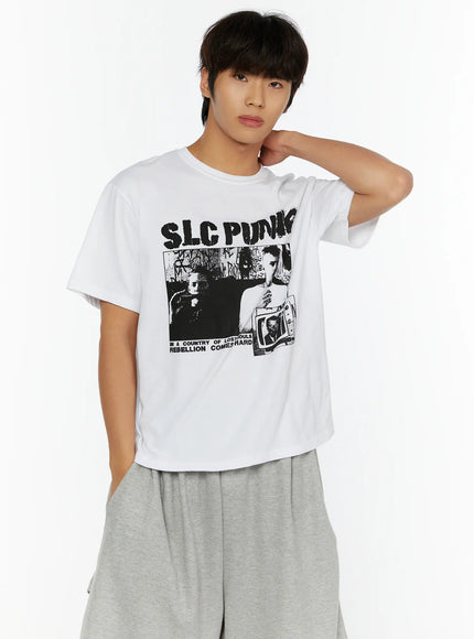 Men's Punk Graphic T-Shirt IL513 White front close-up shot on male model hand resting on neck showing full SLC PUNK graphic print on oversized cotton tee