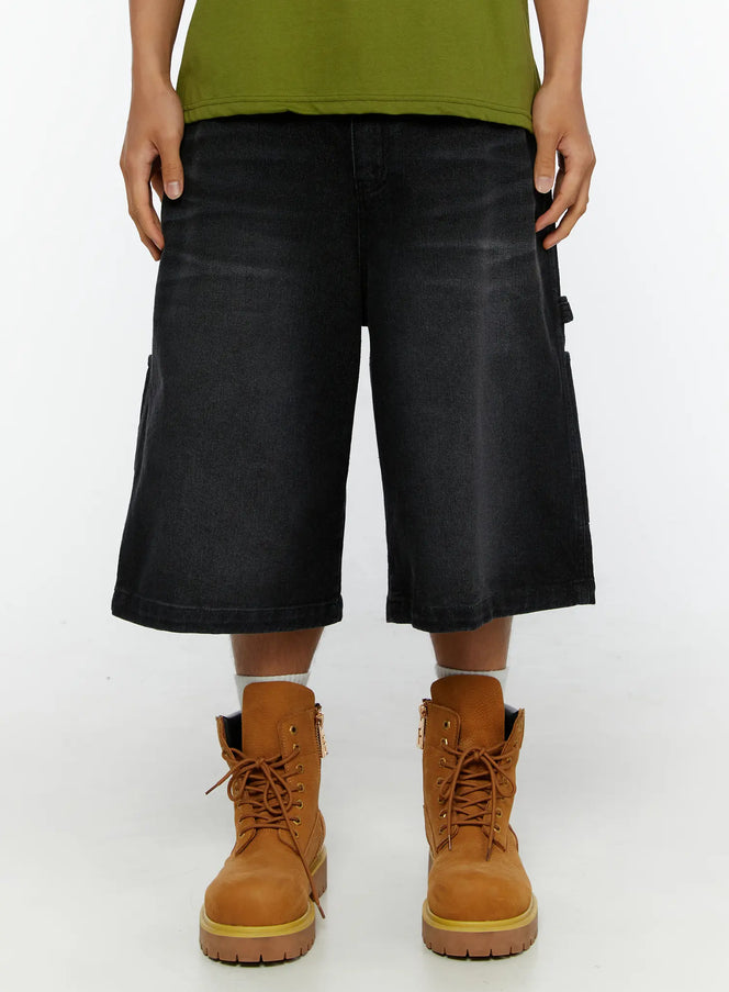 LEWKIN Men's Relaxed Denim Carpenter Shorts IL513 Black front close-up on model size S, wide-leg washed denim, worn with olive tee and tan boots